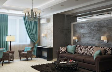 A living room with blue and brown accents.